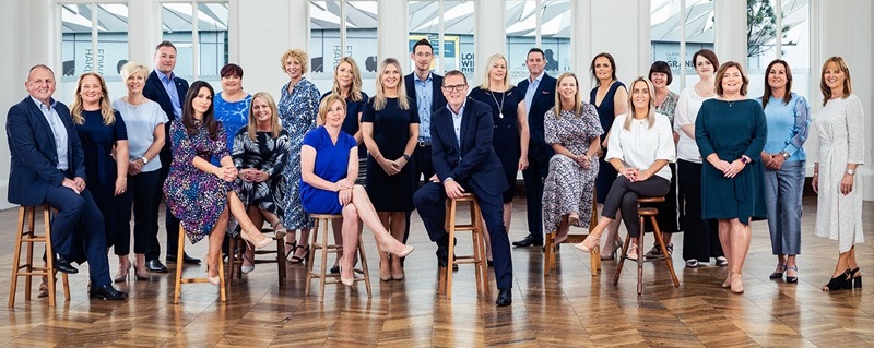 Photo of CashBank Group team celebrating.